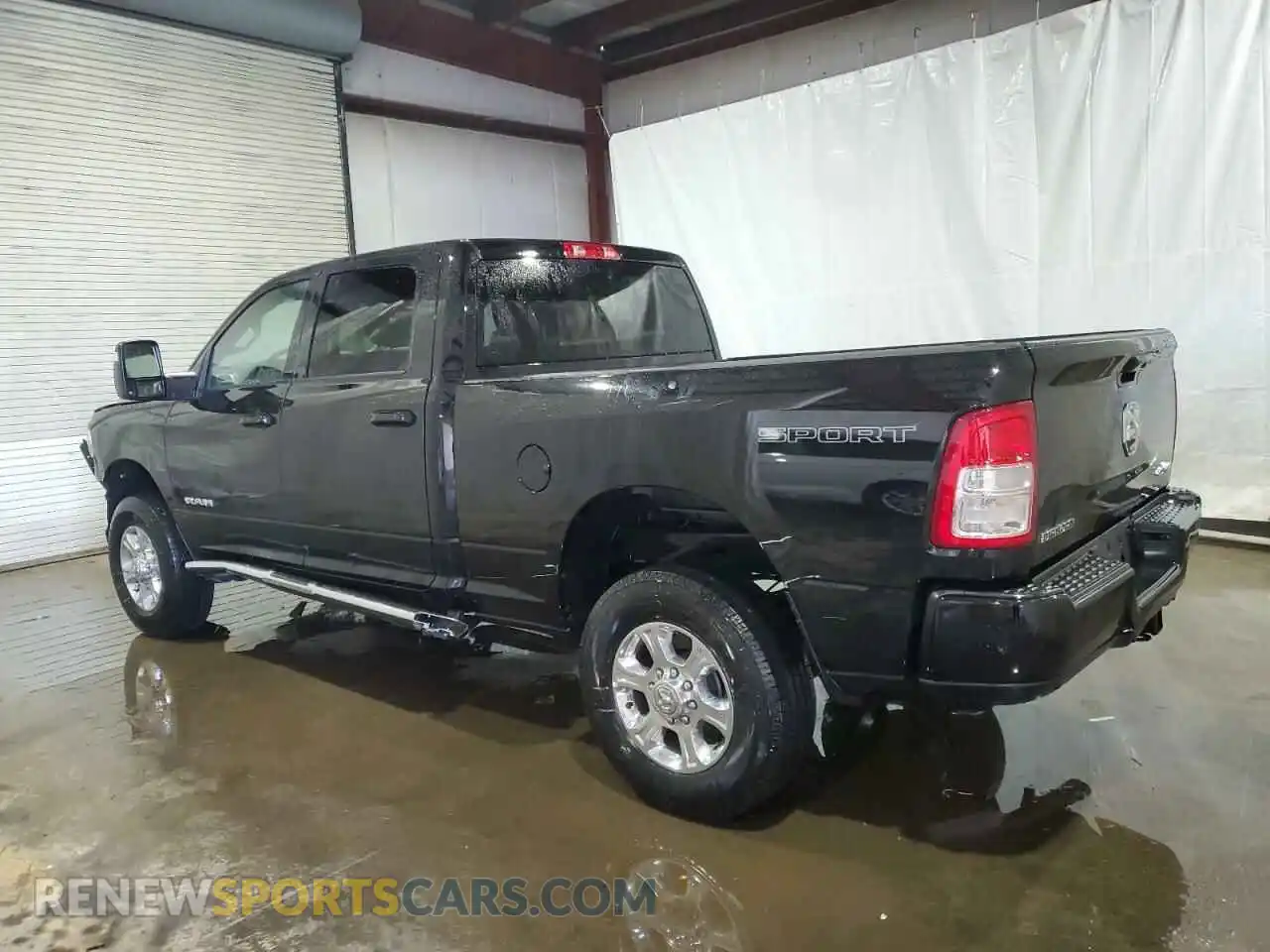 2 Photograph of a damaged car 3C6UR5DJ5RG385403 RAM 2500 2024