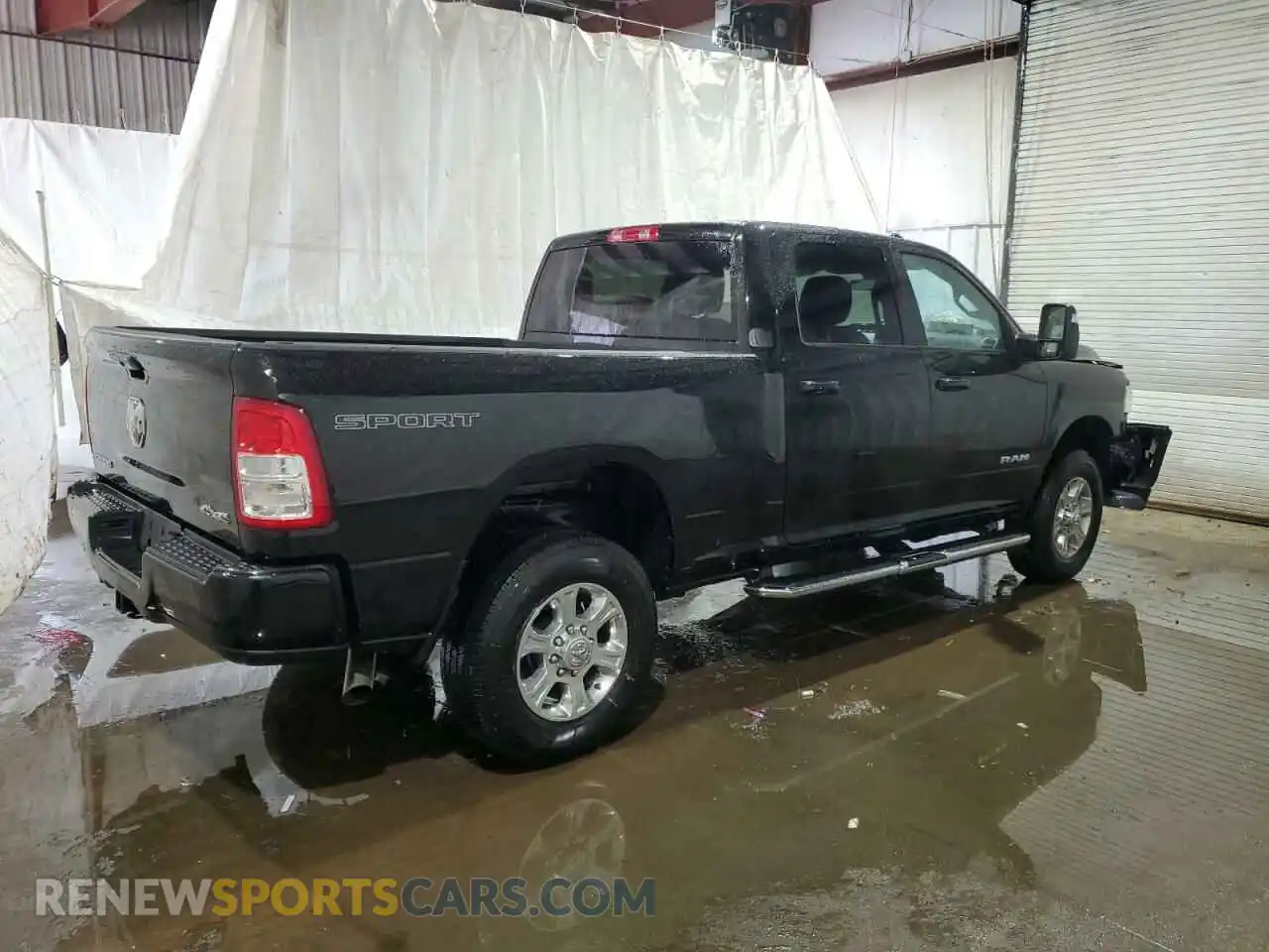 3 Photograph of a damaged car 3C6UR5DJ5RG385403 RAM 2500 2024
