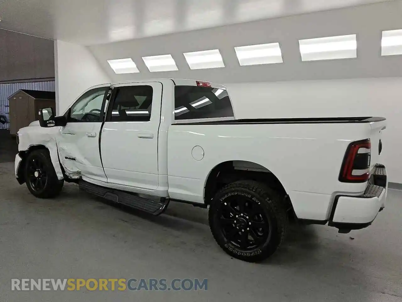 2 Photograph of a damaged car 3C6UR5DJ5RG395106 RAM 2500 2024