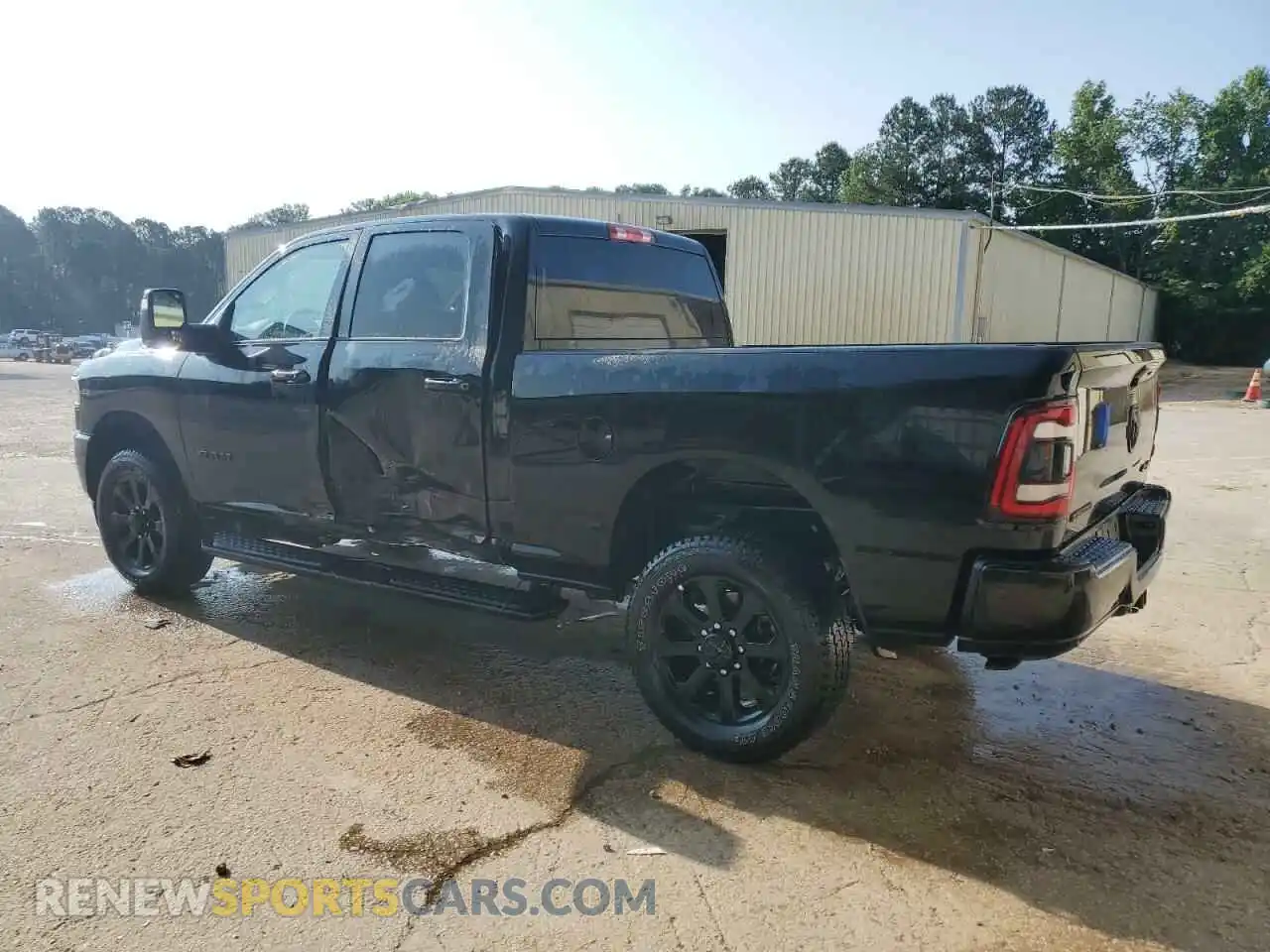 2 Photograph of a damaged car 3C6UR5DJ5RG397132 RAM 2500 2024