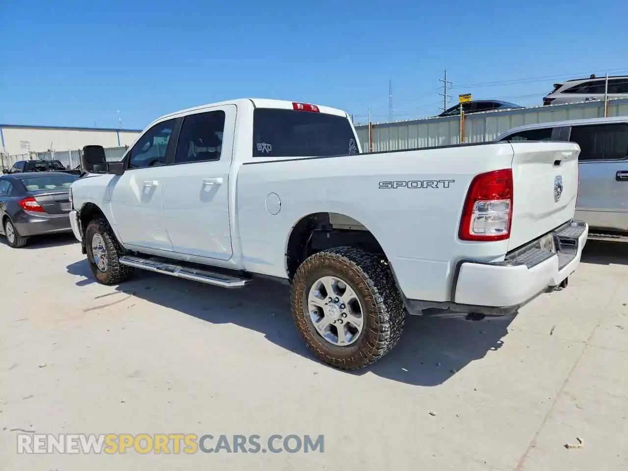 2 Photograph of a damaged car 3C6UR5DJ6RG386253 RAM 2500 2024