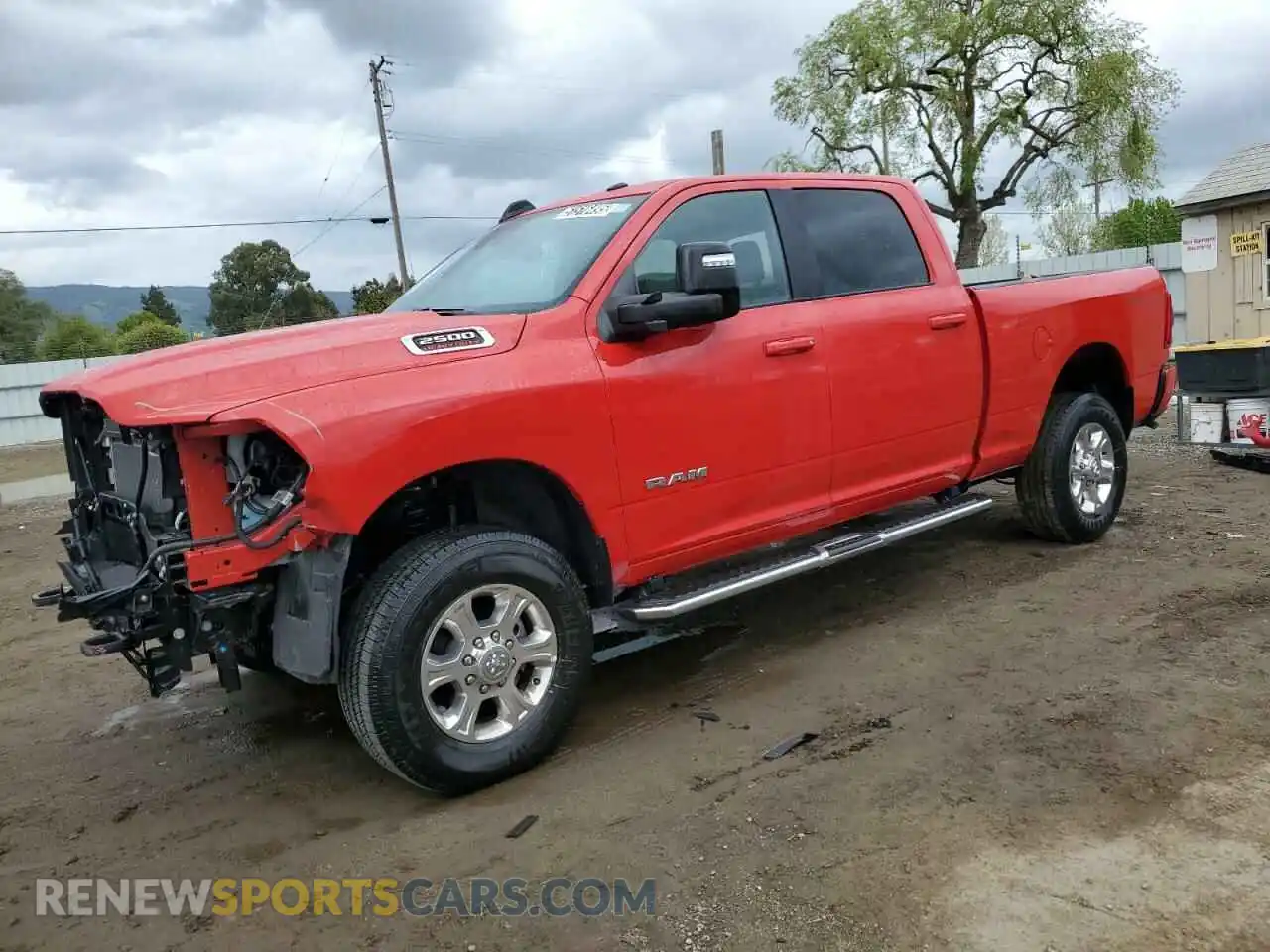 1 Photograph of a damaged car 3C6UR5DJ6RG386446 RAM 2500 2024