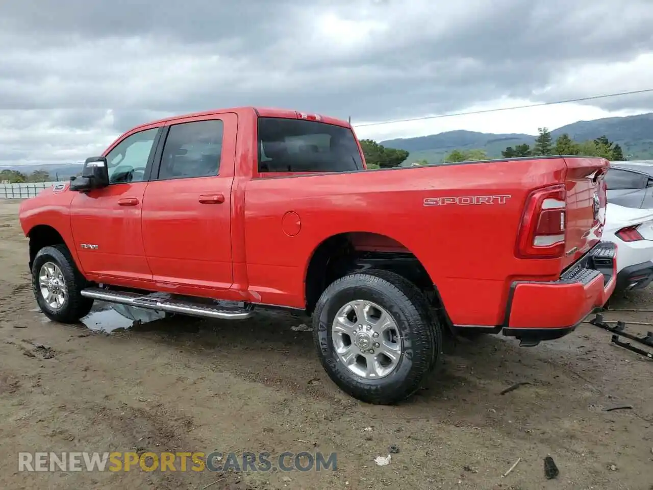2 Photograph of a damaged car 3C6UR5DJ6RG386446 RAM 2500 2024