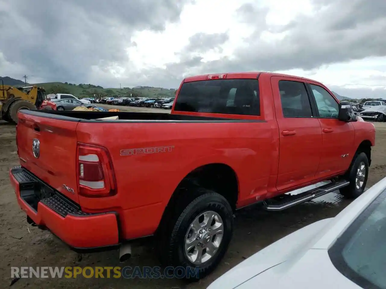 3 Photograph of a damaged car 3C6UR5DJ6RG386446 RAM 2500 2024
