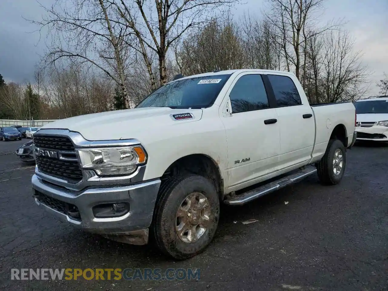 1 Photograph of a damaged car 3C6UR5DJ6RG396569 RAM 2500 2024