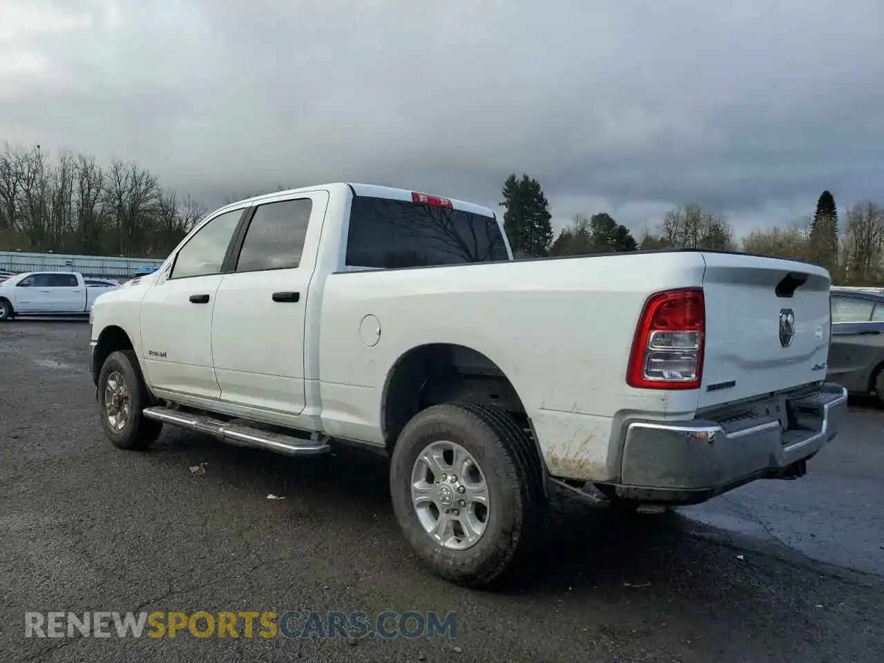 2 Photograph of a damaged car 3C6UR5DJ6RG396569 RAM 2500 2024