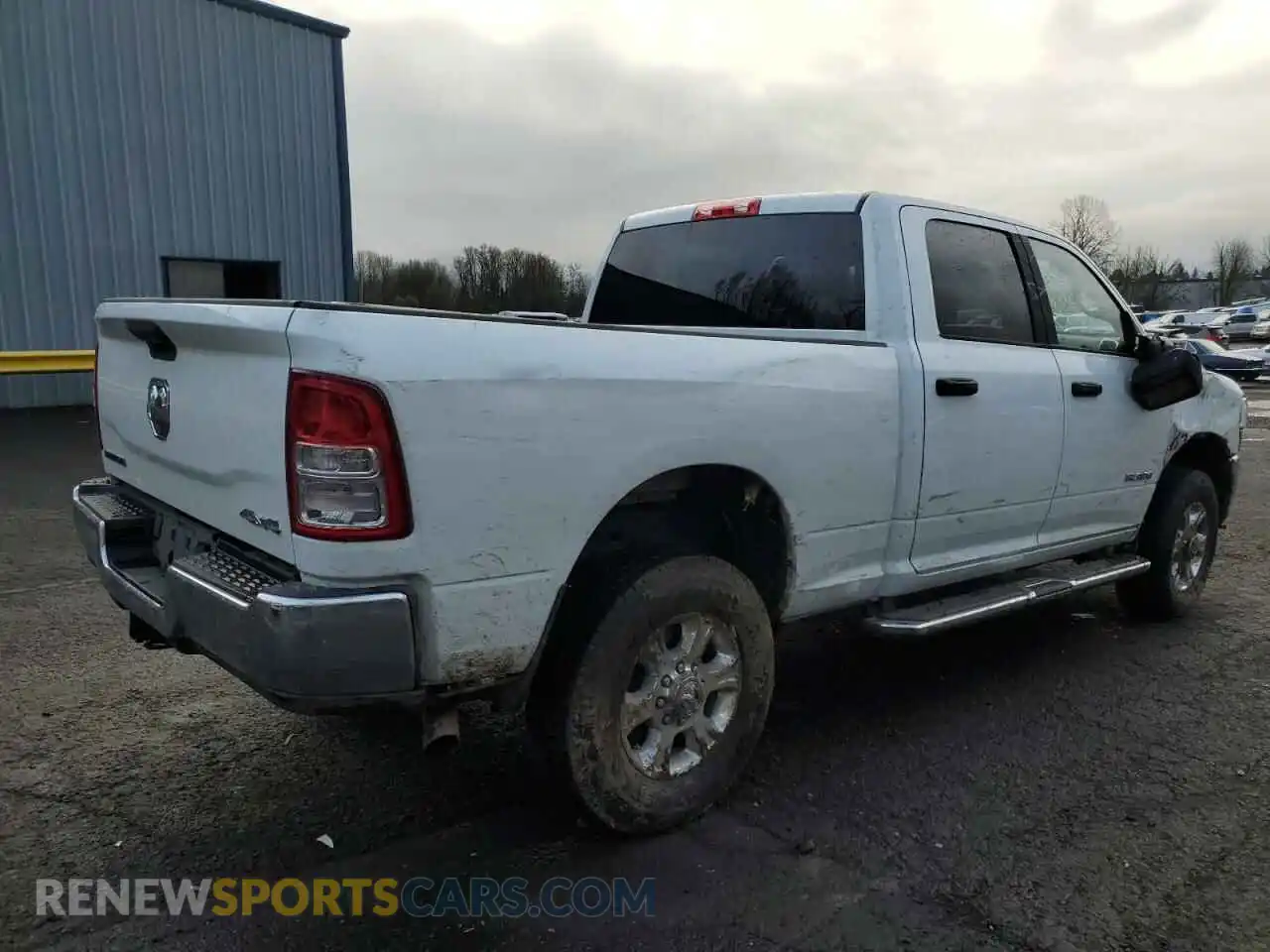 3 Photograph of a damaged car 3C6UR5DJ6RG396569 RAM 2500 2024