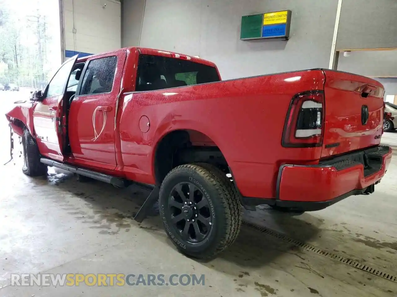 2 Photograph of a damaged car 3C6UR5DJ6RG397057 RAM 2500 2024