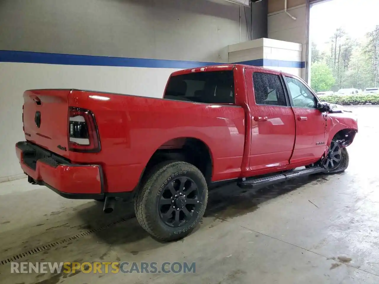 3 Photograph of a damaged car 3C6UR5DJ6RG397057 RAM 2500 2024