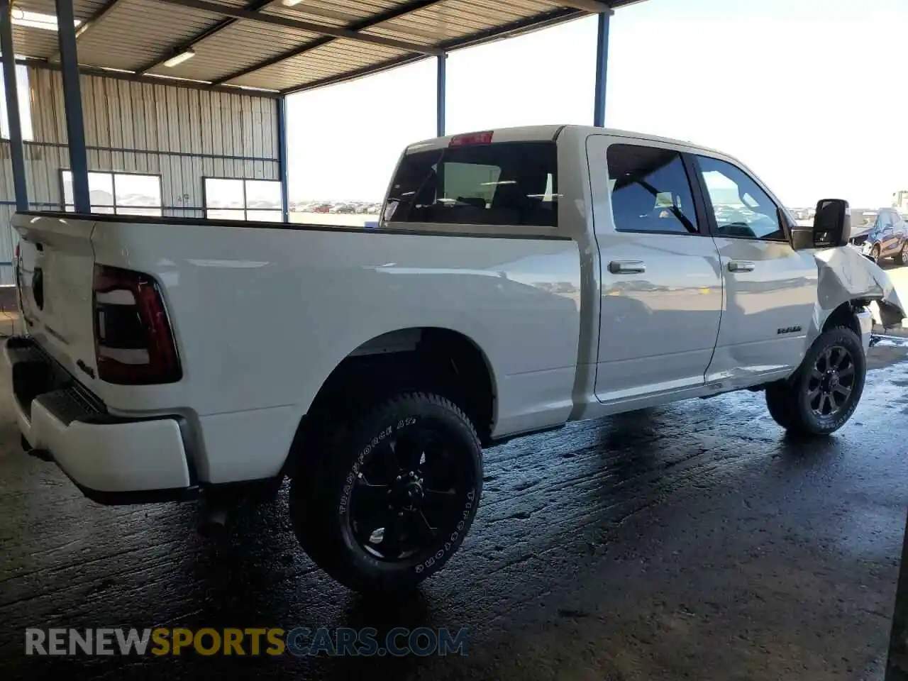 3 Photograph of a damaged car 3C6UR5DJ7RG394359 RAM 2500 2024