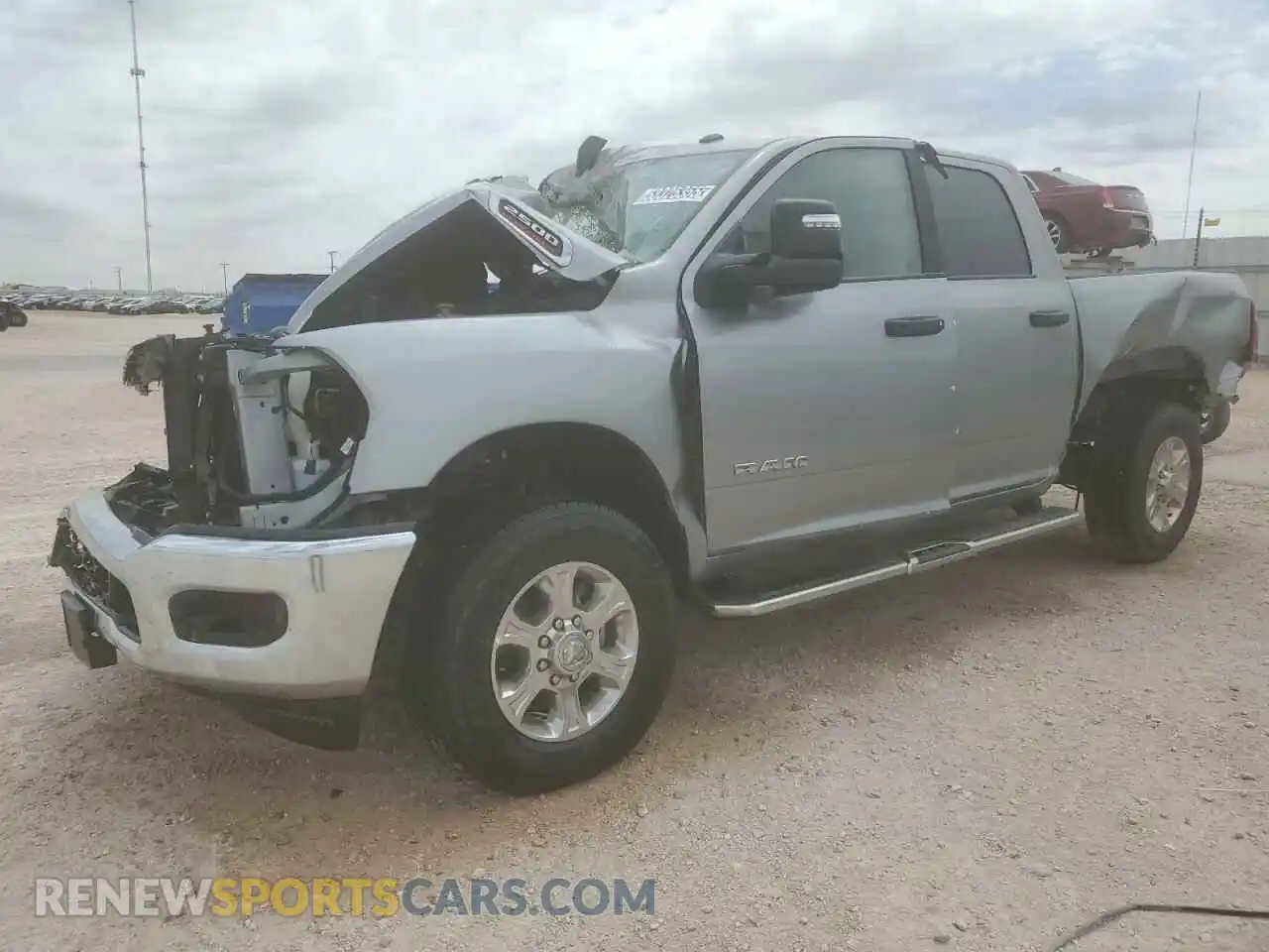 1 Photograph of a damaged car 3C6UR5DJ8RG387050 RAM 2500 2024