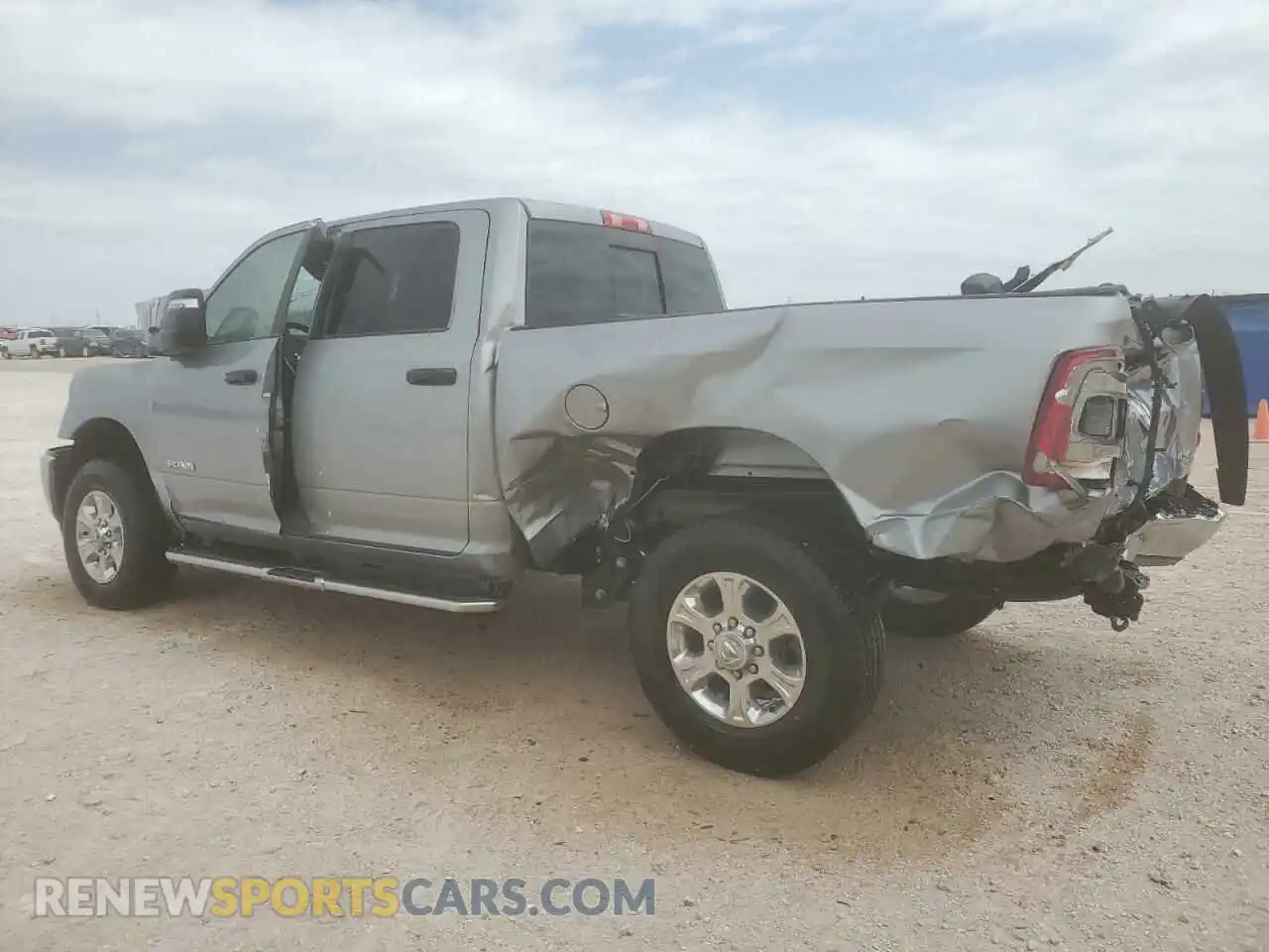 2 Photograph of a damaged car 3C6UR5DJ8RG387050 RAM 2500 2024