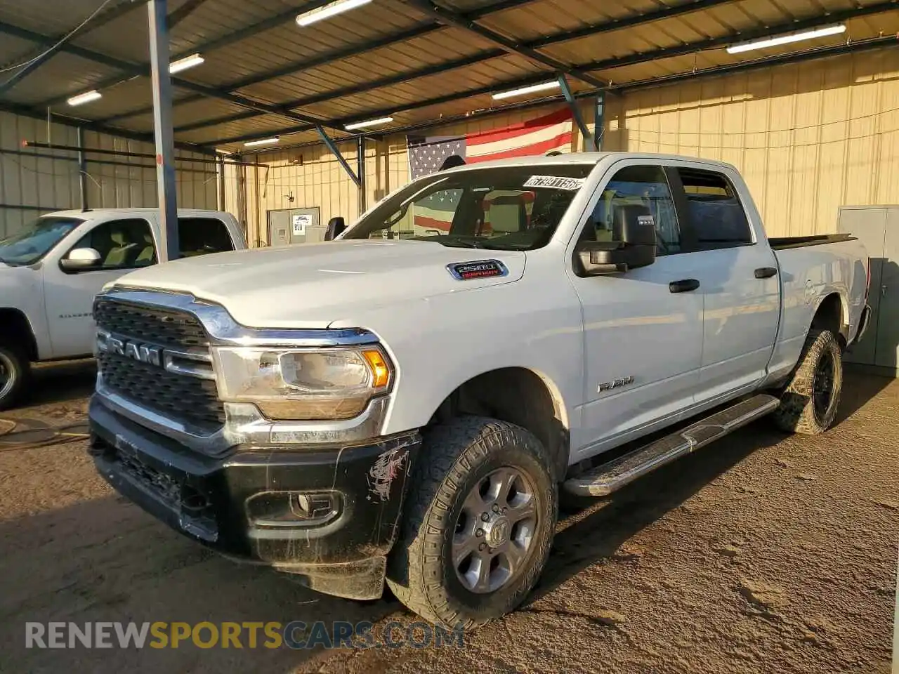 1 Photograph of a damaged car 3C6UR5DJ8RG397707 RAM 2500 2024