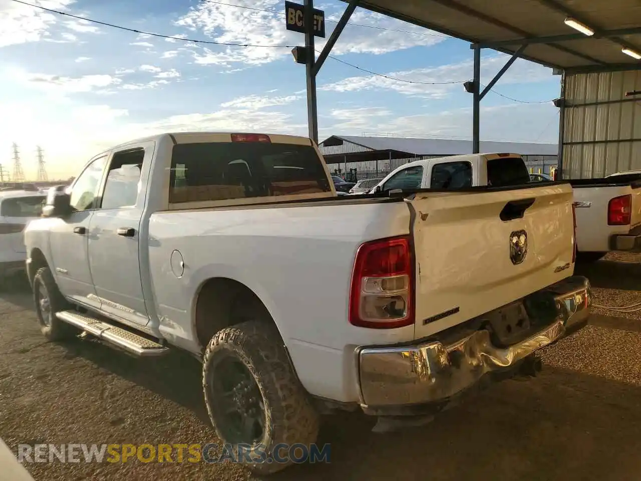 2 Photograph of a damaged car 3C6UR5DJ8RG397707 RAM 2500 2024