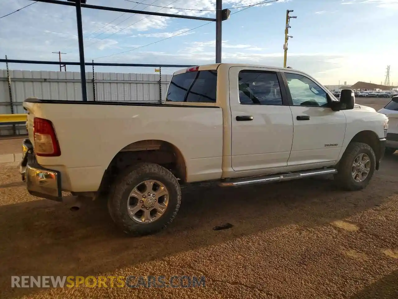 3 Photograph of a damaged car 3C6UR5DJ8RG397707 RAM 2500 2024