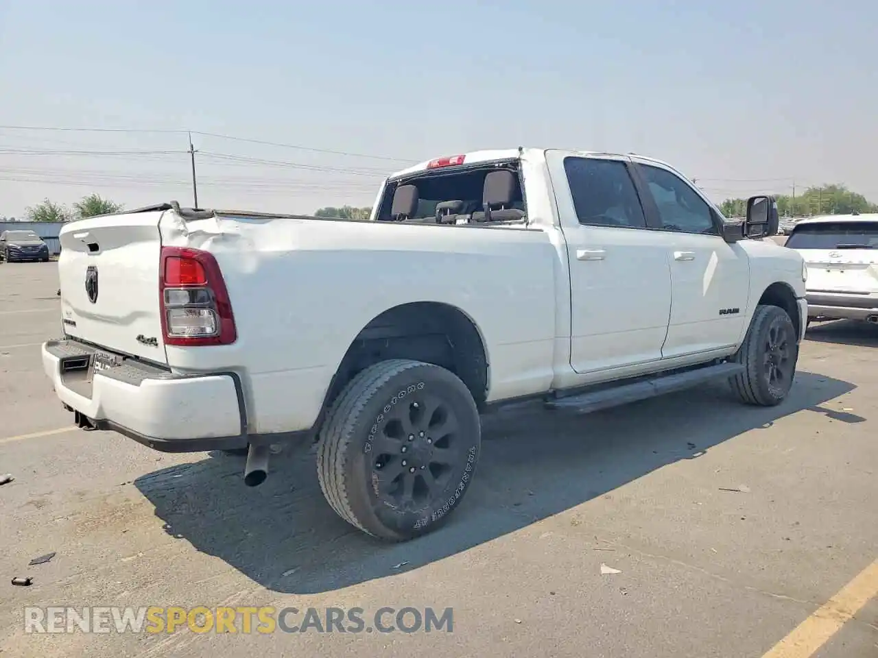 3 Photograph of a damaged car 3C6UR5DJ9RG217389 RAM 2500 2024