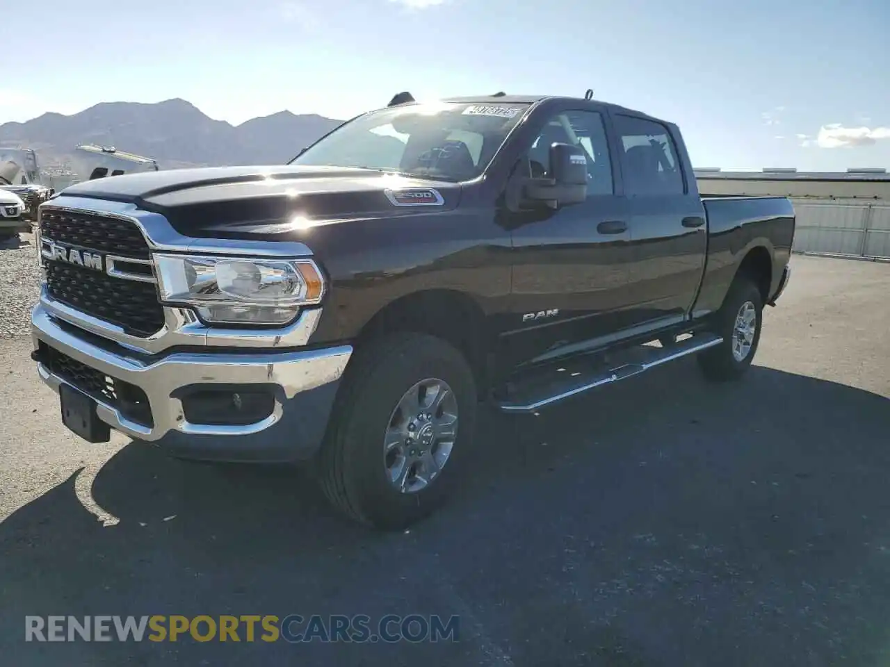 1 Photograph of a damaged car 3C6UR5DJ9RG323356 RAM 2500 2024