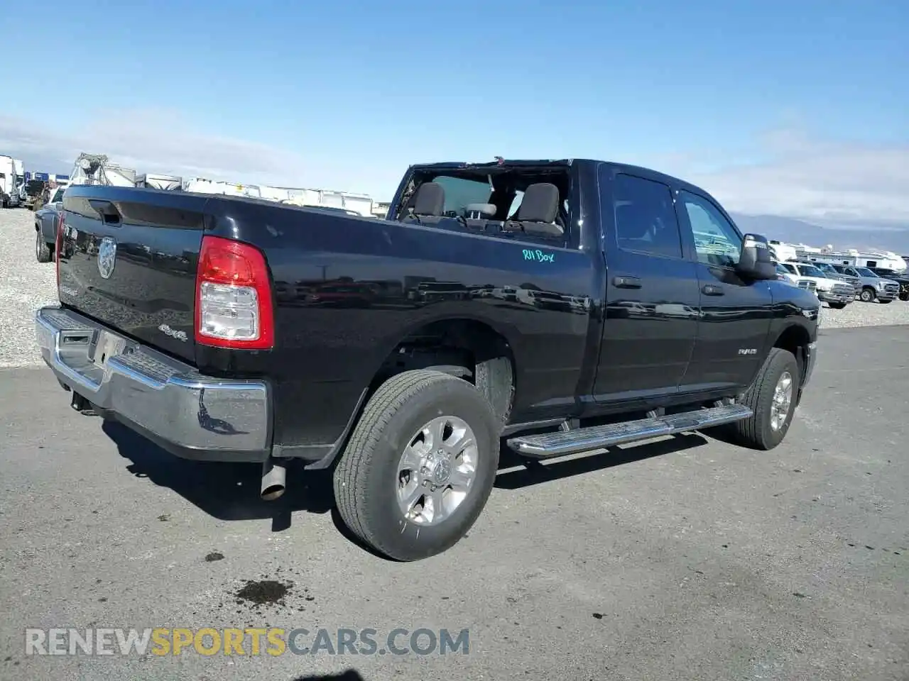 3 Photograph of a damaged car 3C6UR5DJ9RG323356 RAM 2500 2024
