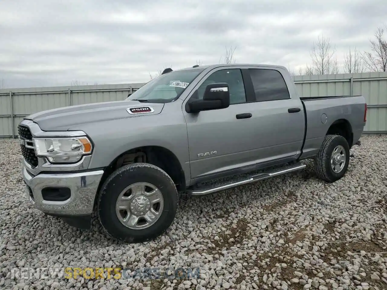 1 Photograph of a damaged car 3C6UR5DJ9RG342070 RAM 2500 2024