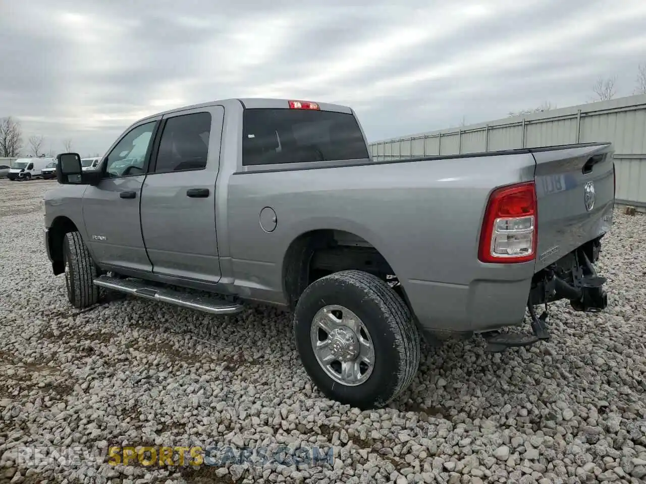 2 Photograph of a damaged car 3C6UR5DJ9RG342070 RAM 2500 2024