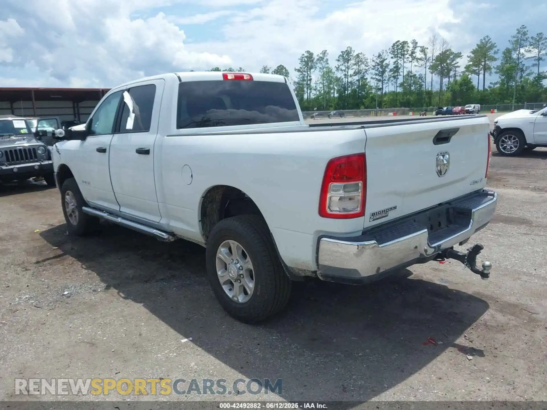 3 Photograph of a damaged car 3C6UR5DJ9RG364926 RAM 2500 2024