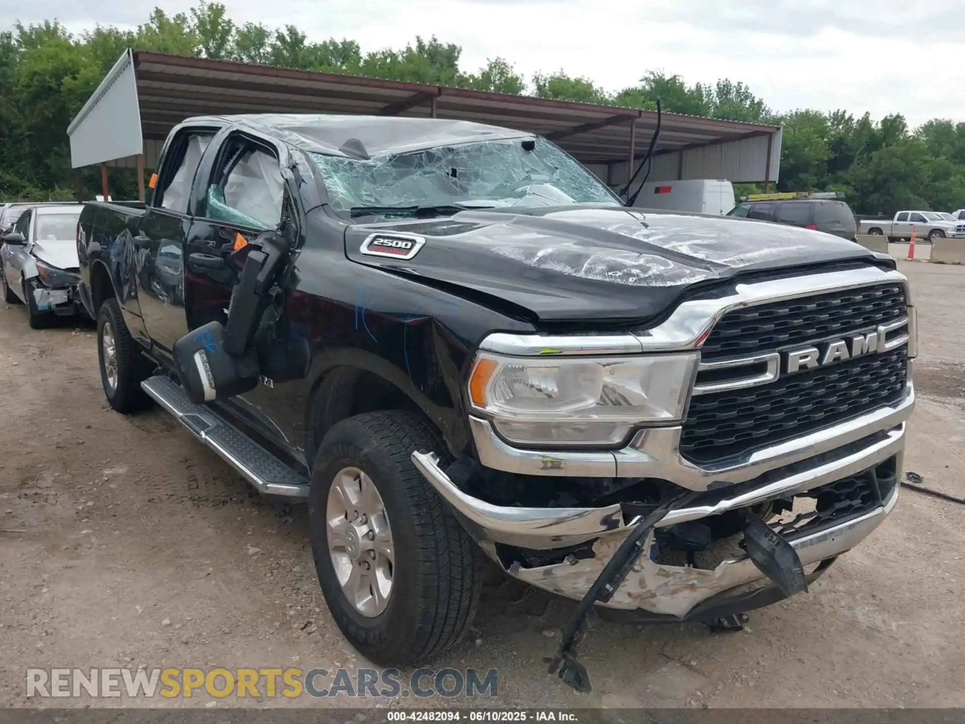 1 Photograph of a damaged car 3C6UR5DJ9RG365218 RAM 2500 2024