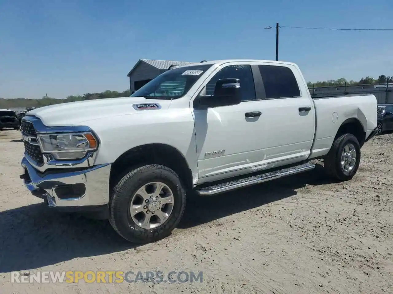 1 Photograph of a damaged car 3C6UR5DJ9RG385663 RAM 2500 2024