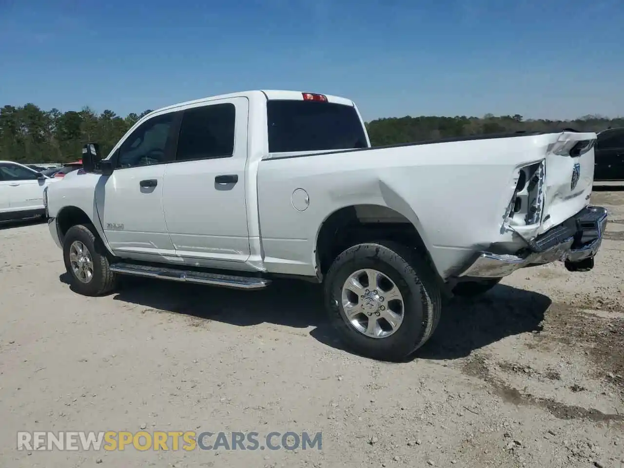 2 Photograph of a damaged car 3C6UR5DJ9RG385663 RAM 2500 2024
