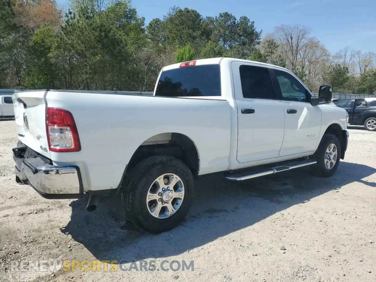 3 Photograph of a damaged car 3C6UR5DJ9RG385663 RAM 2500 2024