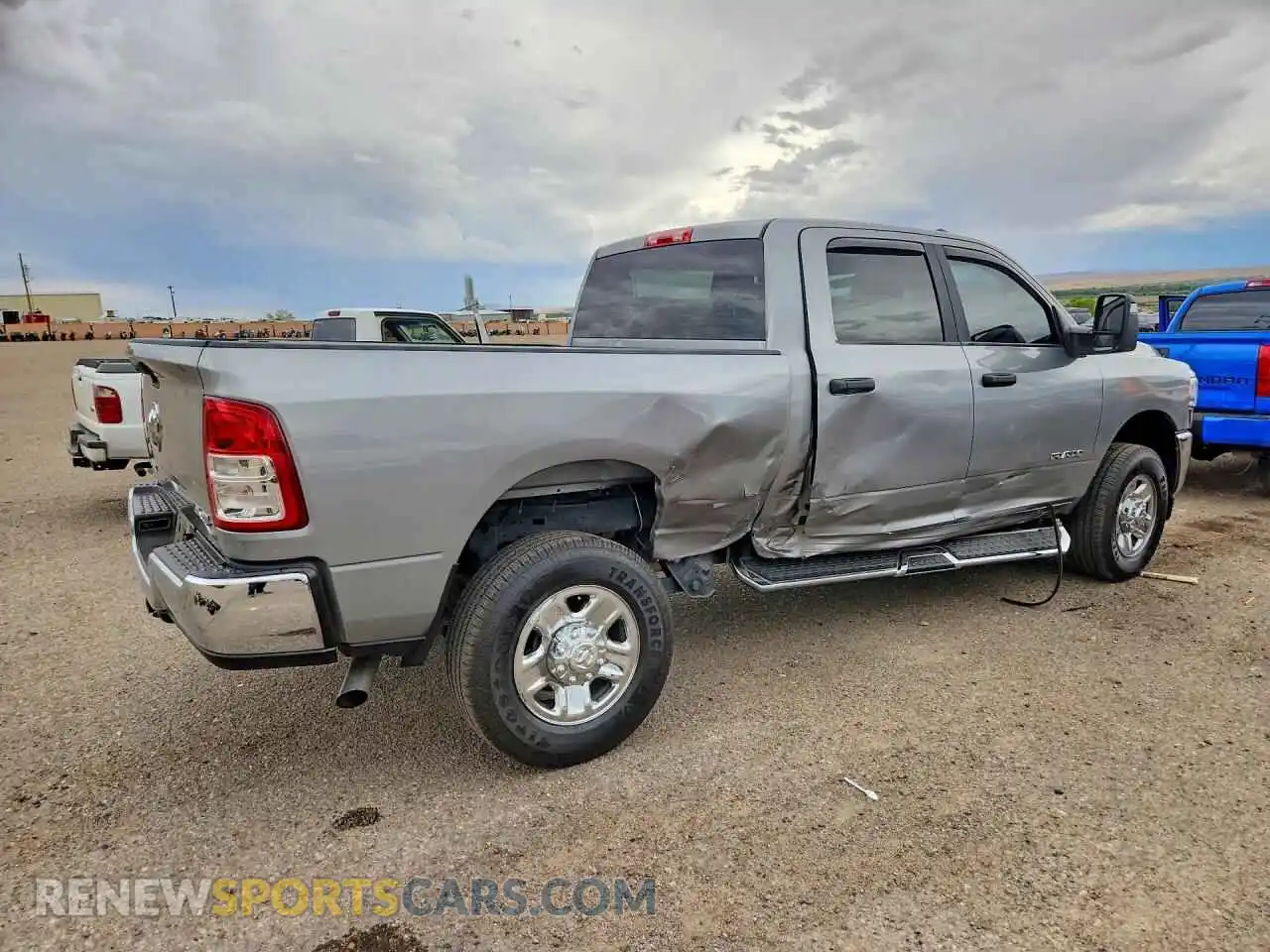 3 Photograph of a damaged car 3C6UR5DJXRG354518 RAM 2500 2024