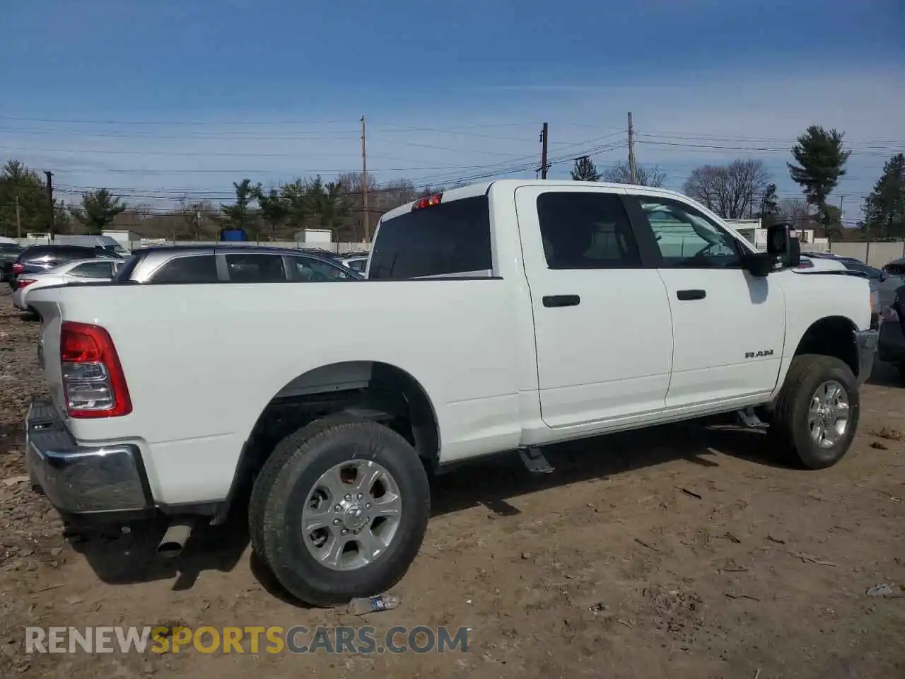 3 Photograph of a damaged car 3C6UR5DJXRG396977 RAM 2500 2024