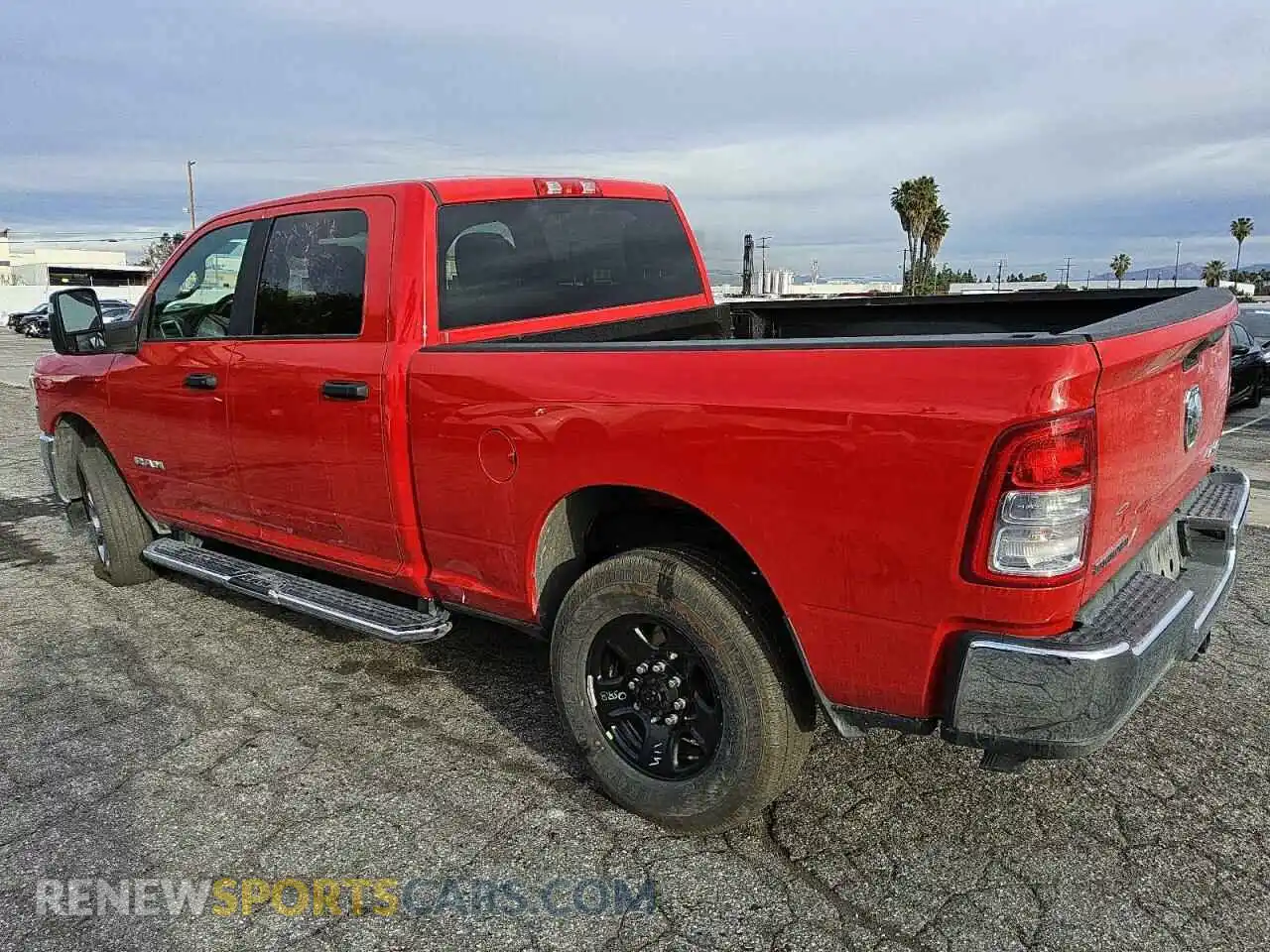 2 Photograph of a damaged car 3C6UR5DJXRG406584 RAM 2500 2024