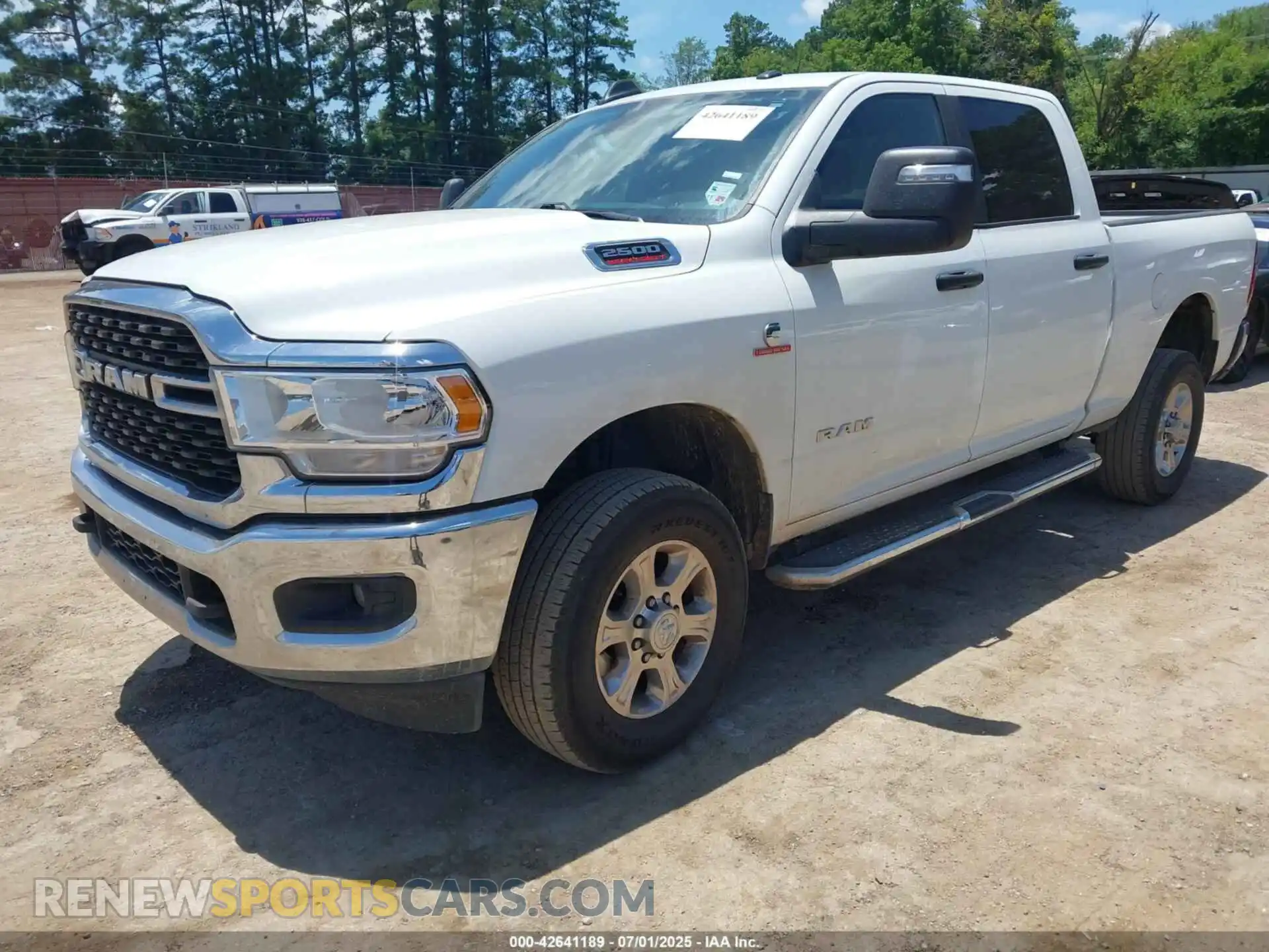 2 Photograph of a damaged car 3C6UR5DL0RG153762 RAM 2500 2024
