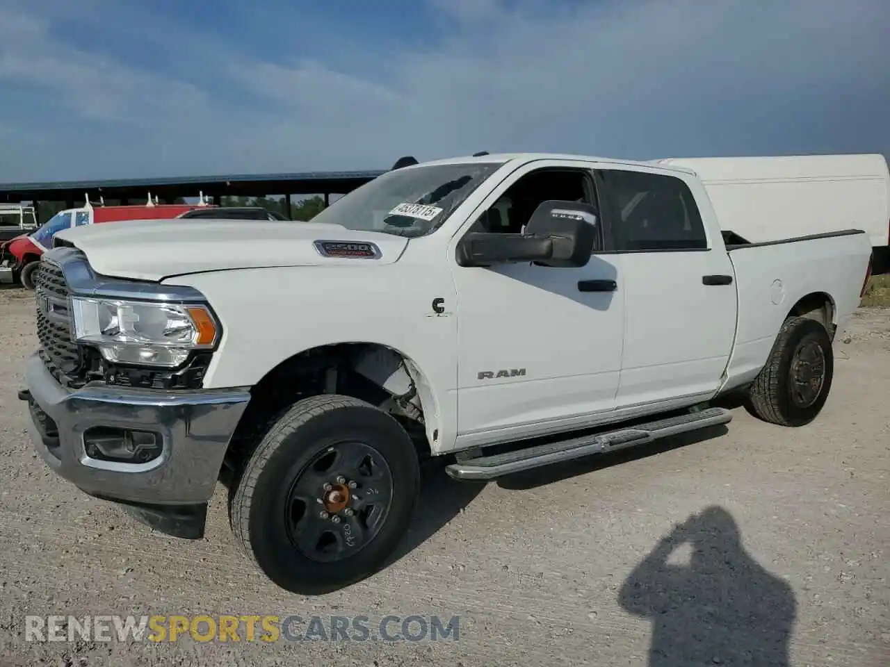 2 Photograph of a damaged car 3C6UR5DL0RG176975 RAM 2500 2024