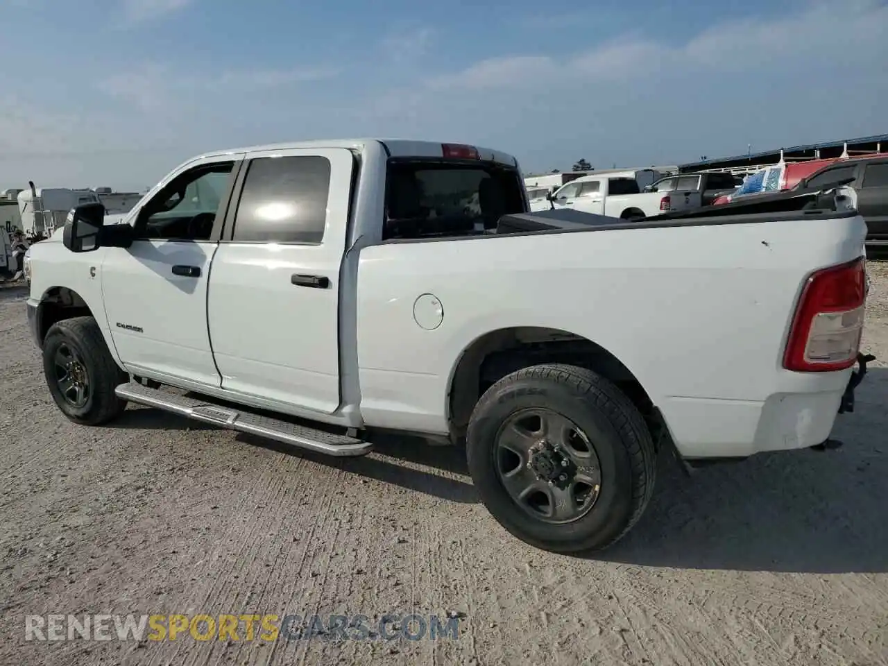 3 Photograph of a damaged car 3C6UR5DL0RG176975 RAM 2500 2024