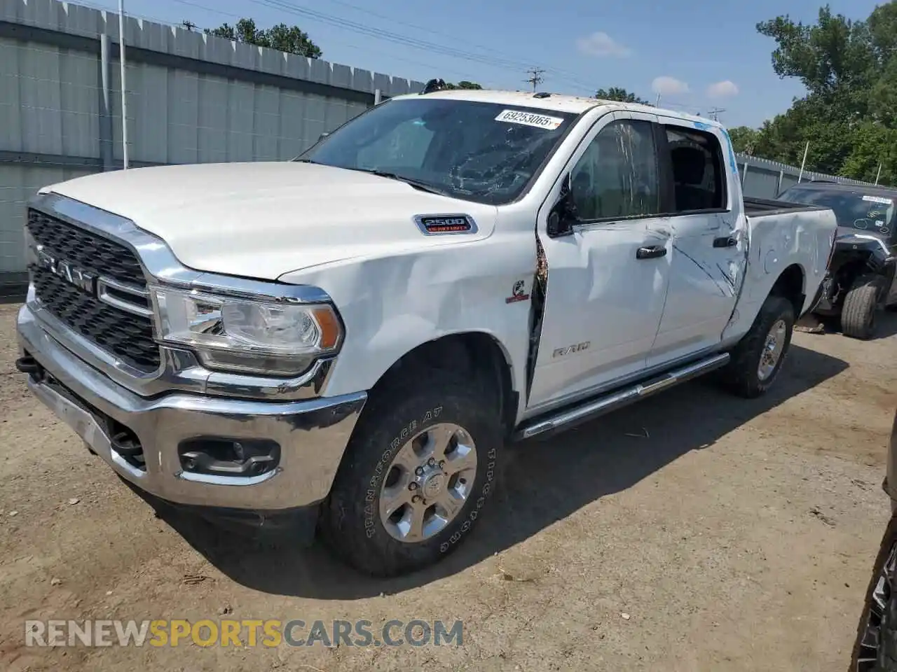 1 Photograph of a damaged car 3C6UR5DL0RG227133 RAM 2500 2024