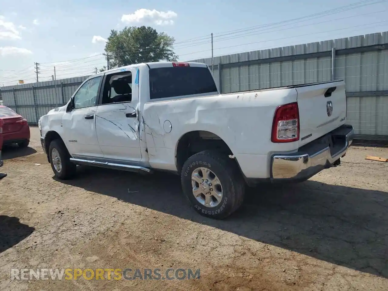 2 Photograph of a damaged car 3C6UR5DL0RG227133 RAM 2500 2024
