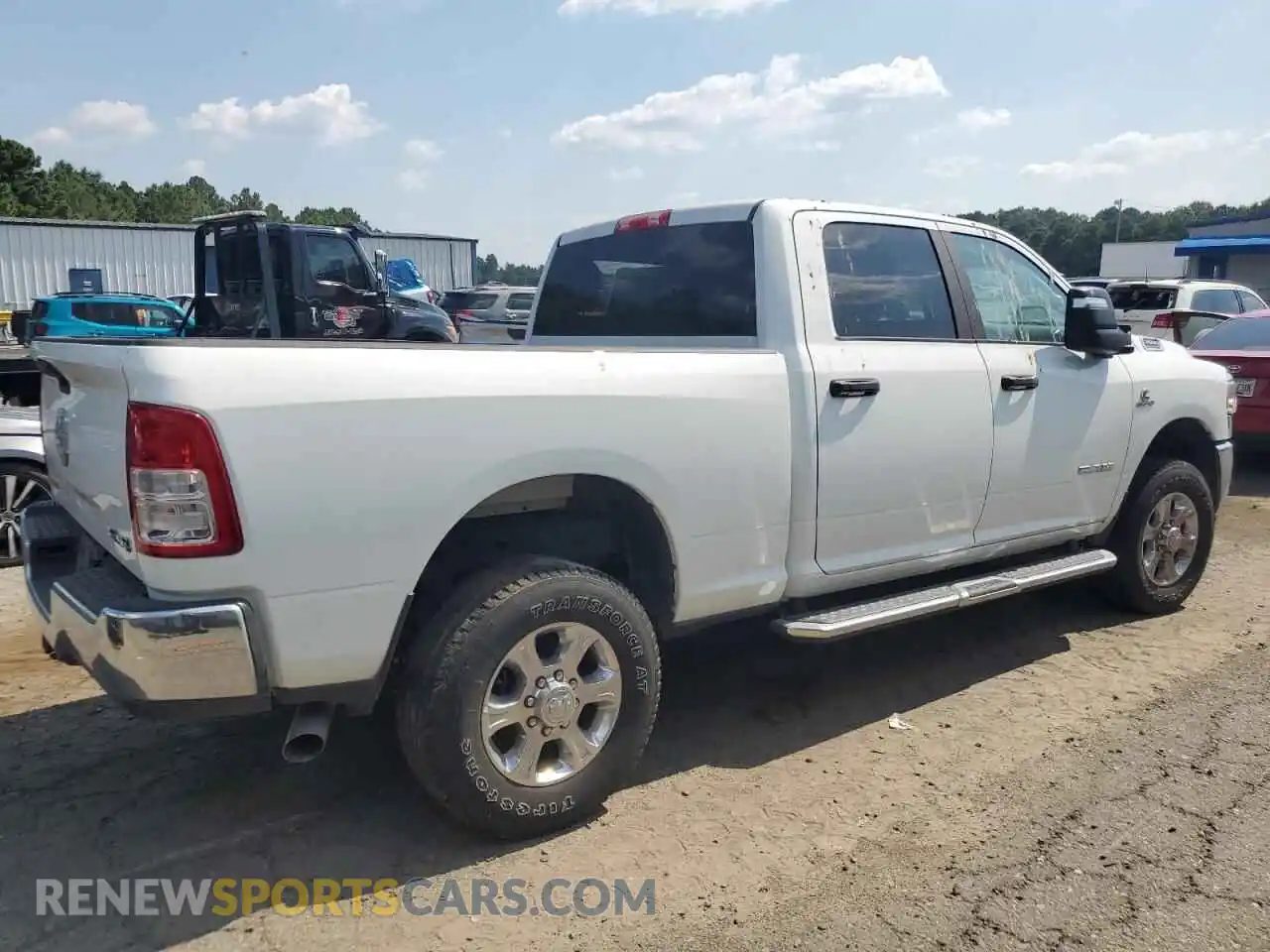 3 Photograph of a damaged car 3C6UR5DL0RG227133 RAM 2500 2024