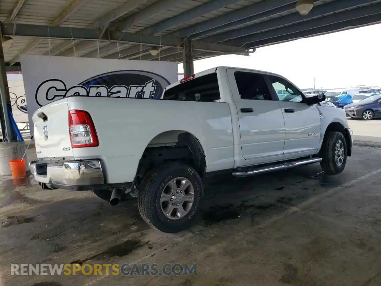 3 Photograph of a damaged car 3C6UR5DL0RG336465 RAM 2500 2024
