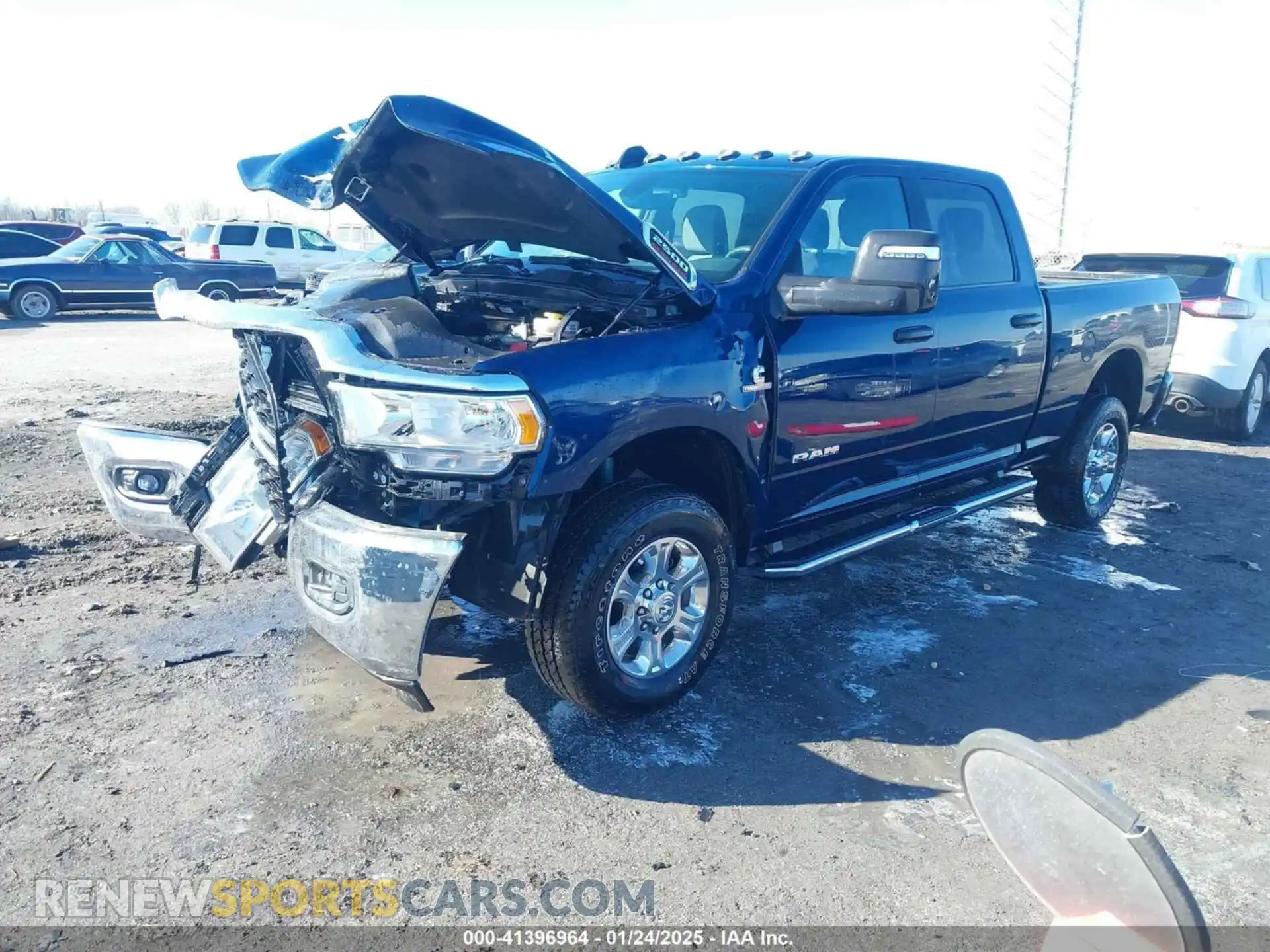 2 Photograph of a damaged car 3C6UR5DL1RG235886 RAM 2500 2024