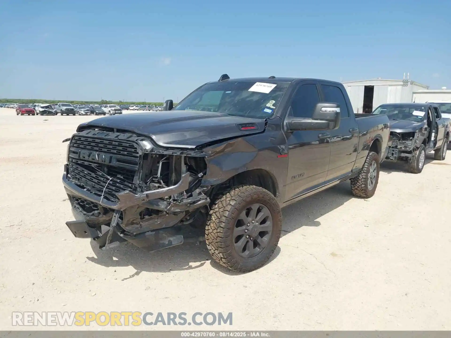 2 Photograph of a damaged car 3C6UR5DL1RG259489 RAM 2500 2024