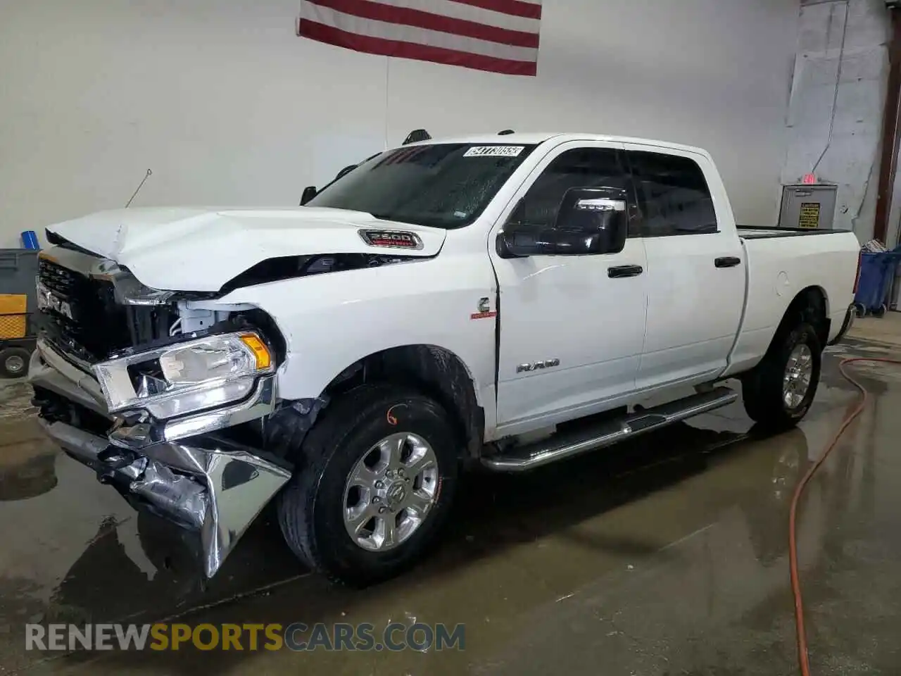 1 Photograph of a damaged car 3C6UR5DL1RG266801 RAM 2500 2024