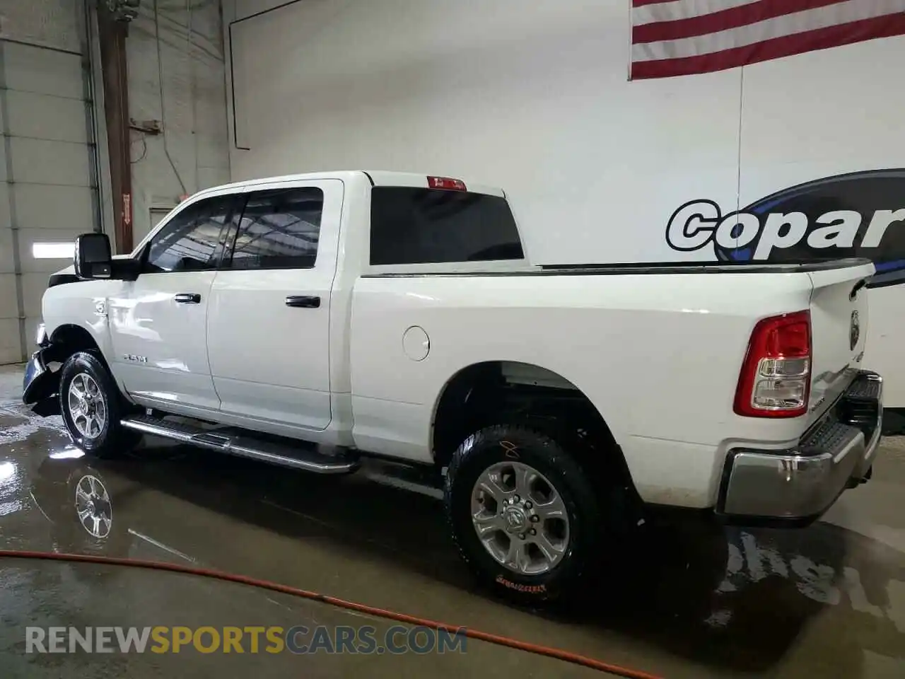 2 Photograph of a damaged car 3C6UR5DL1RG266801 RAM 2500 2024