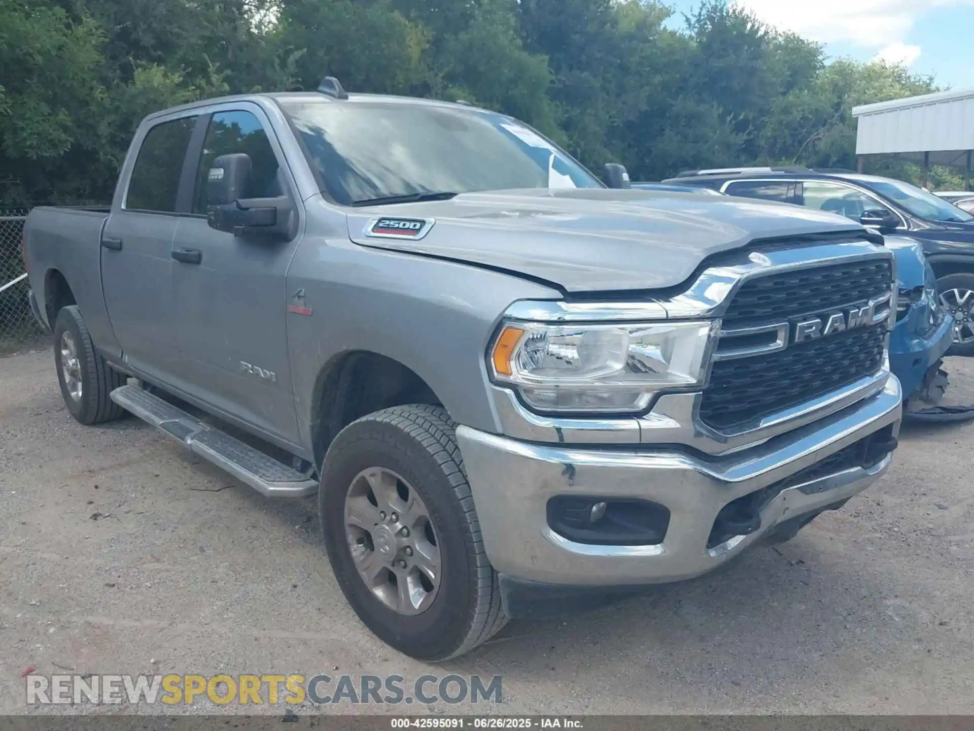 1 Photograph of a damaged car 3C6UR5DL1RG336569 RAM 2500 2024