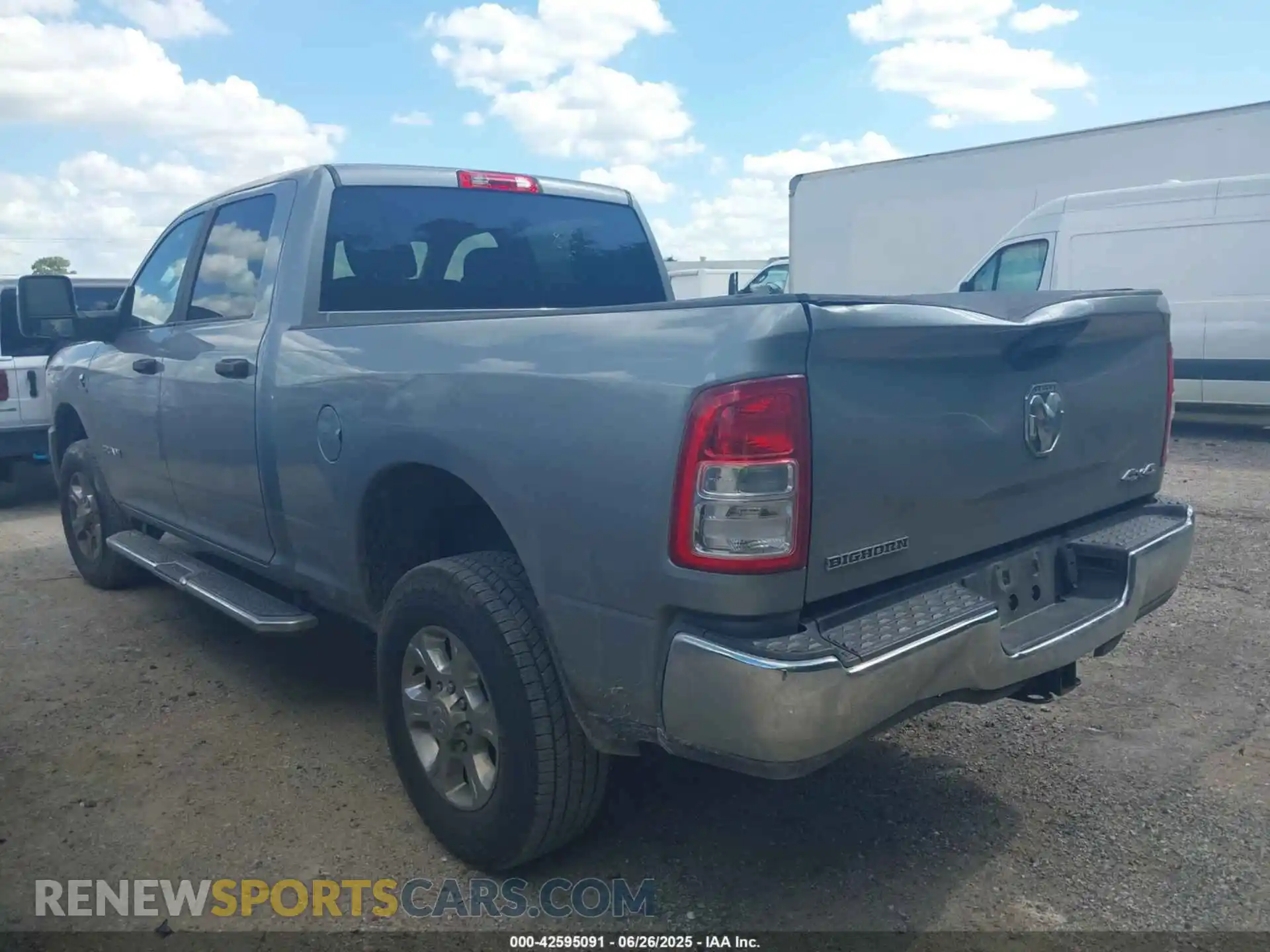 3 Photograph of a damaged car 3C6UR5DL1RG336569 RAM 2500 2024