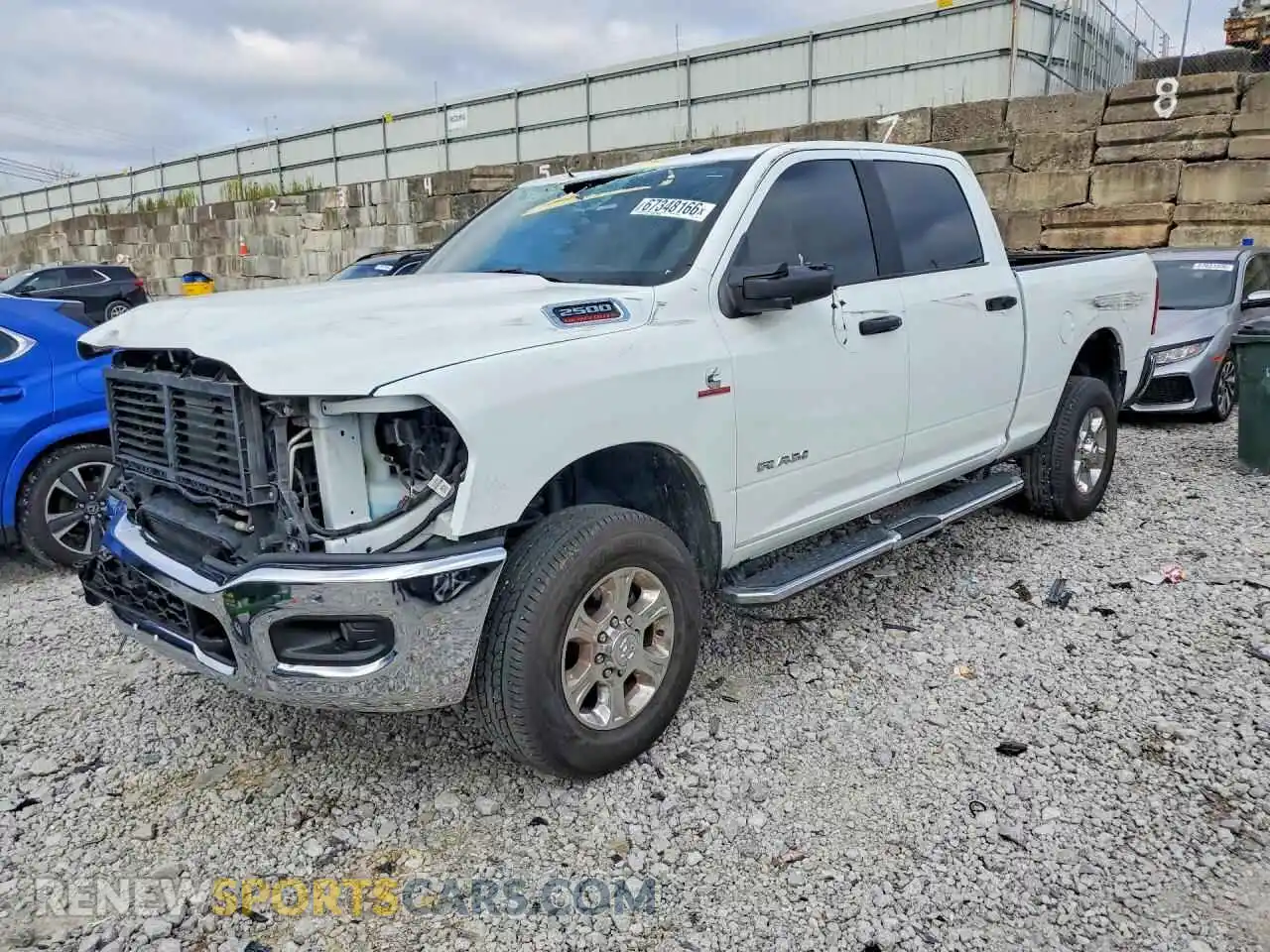 1 Photograph of a damaged car 3C6UR5DL1RG340234 RAM 2500 2024