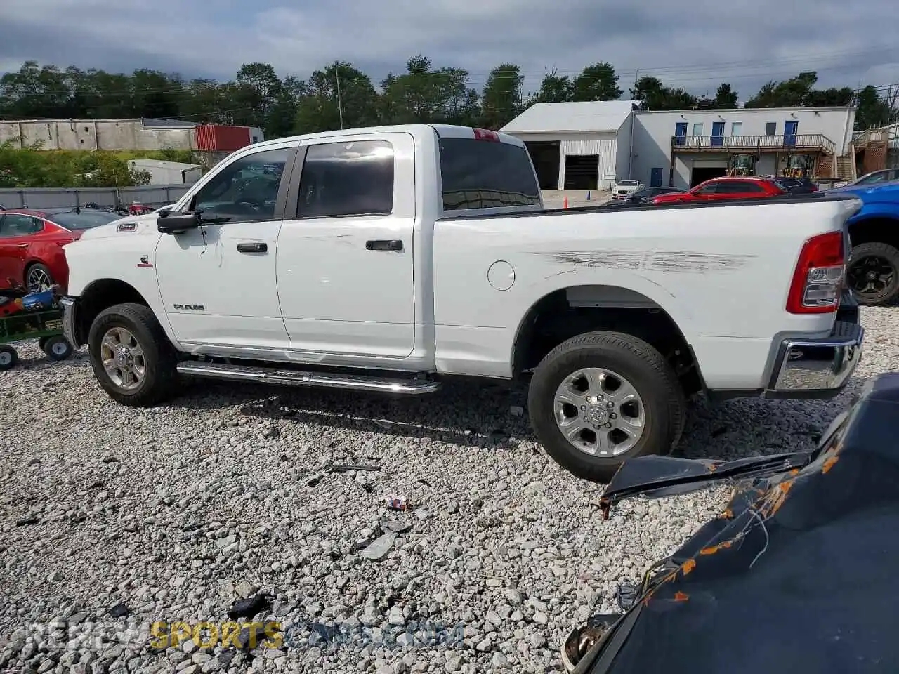 2 Photograph of a damaged car 3C6UR5DL1RG340234 RAM 2500 2024