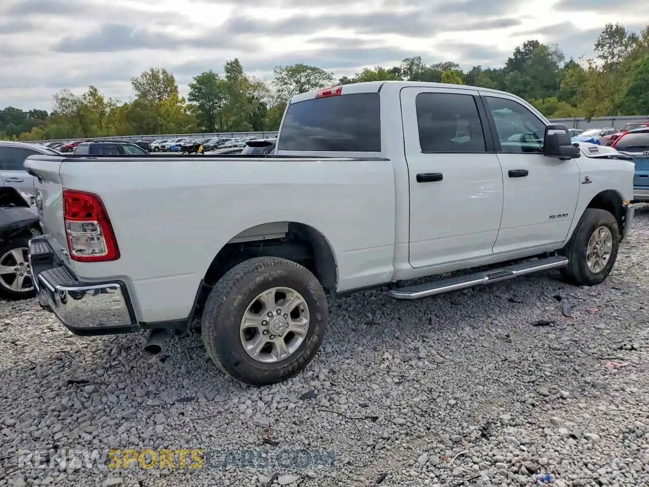 3 Photograph of a damaged car 3C6UR5DL1RG340234 RAM 2500 2024