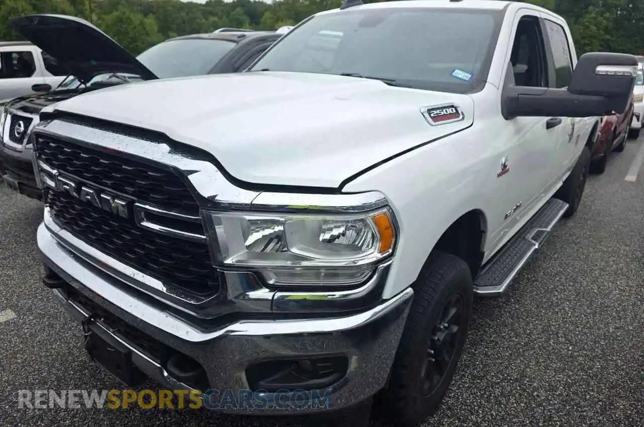 1 Photograph of a damaged car 3C6UR5DL2RG100898 RAM 2500 2024