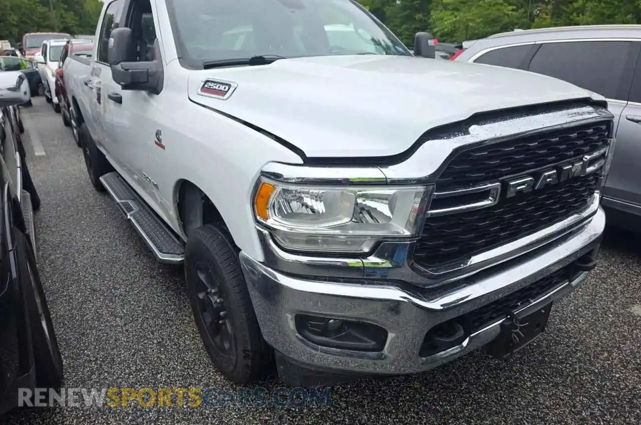 2 Photograph of a damaged car 3C6UR5DL2RG100898 RAM 2500 2024